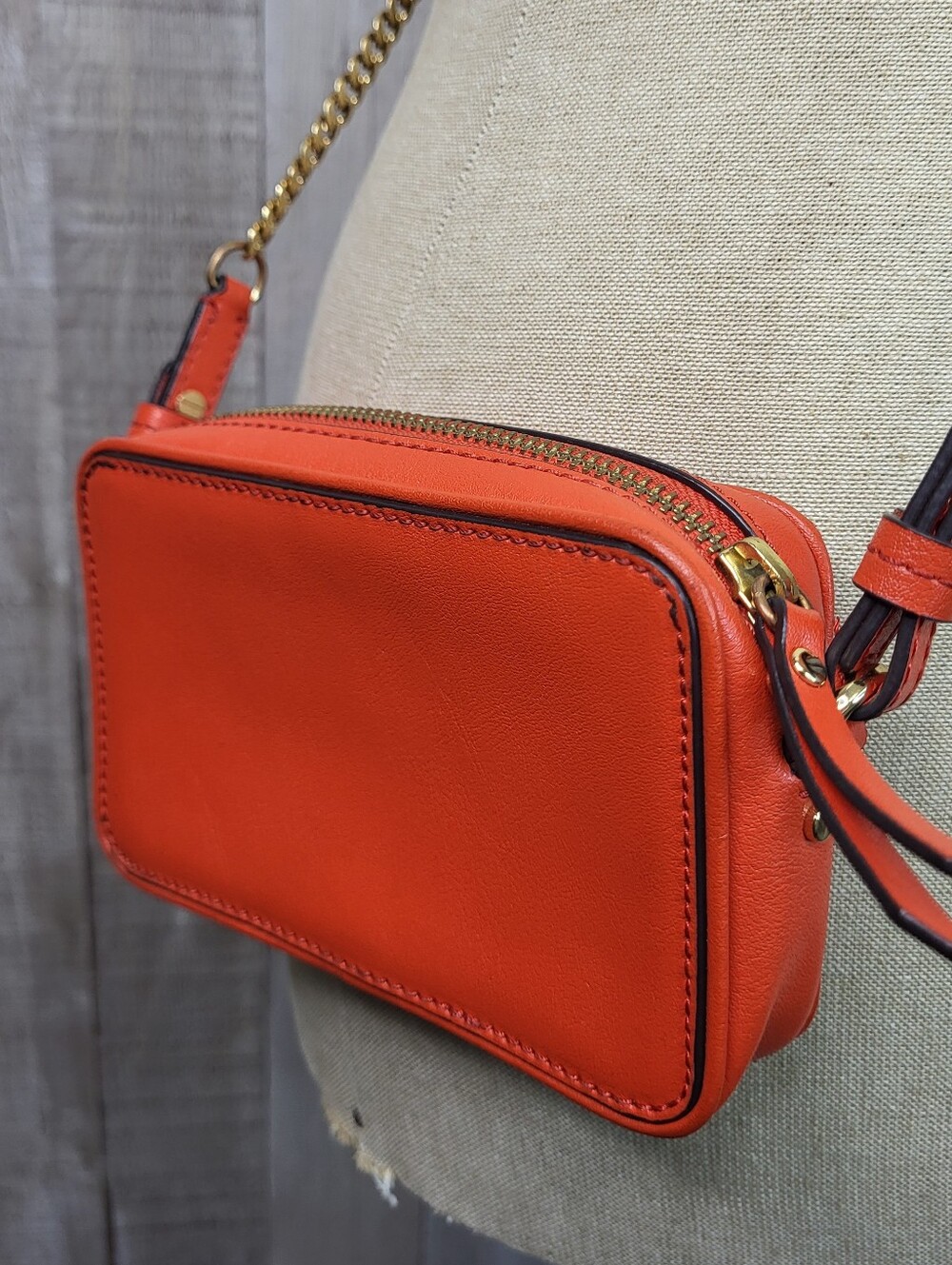 Banana Republic Small Orange Leather Crossbody Bag With Gold Chain.